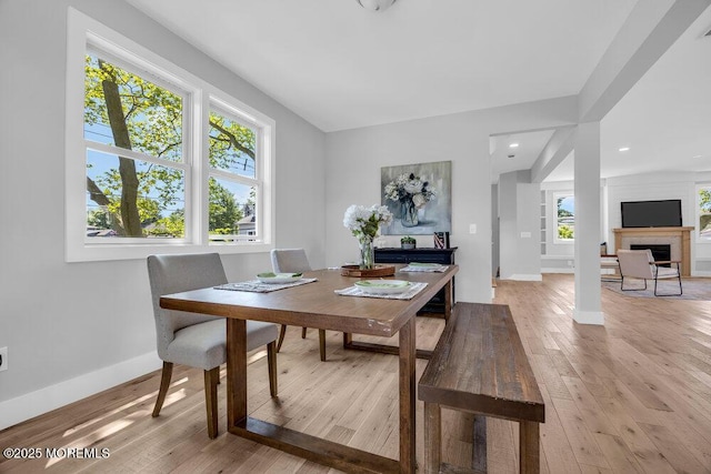 45 Shore Acres Ave, North Middletown, NJ 07748 - dining space featuring light wood-style flooring, a fireplace, and recessed lighting