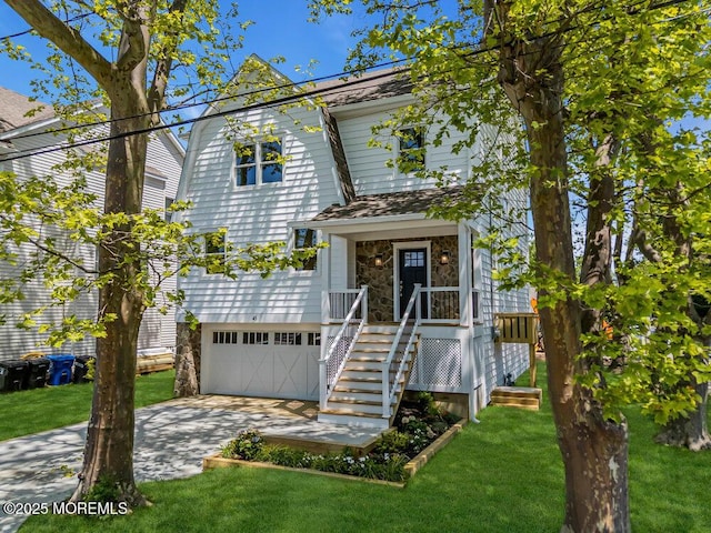 45 Shore Acres Ave, North Middletown, NJ 07748 - view of front of house featuring driveway, a front yard, and a garage