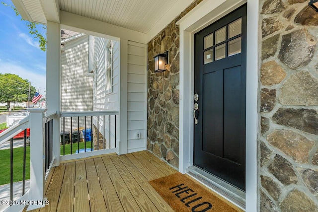 45 Shore Acres Ave, North Middletown, NJ 07748 - property entrance featuring stone siding and a porch