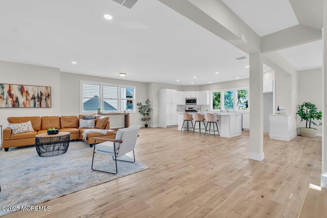 45 Shore Acres Ave, North Middletown, NJ 07748 - living area featuring light wood-style floors and recessed lighting