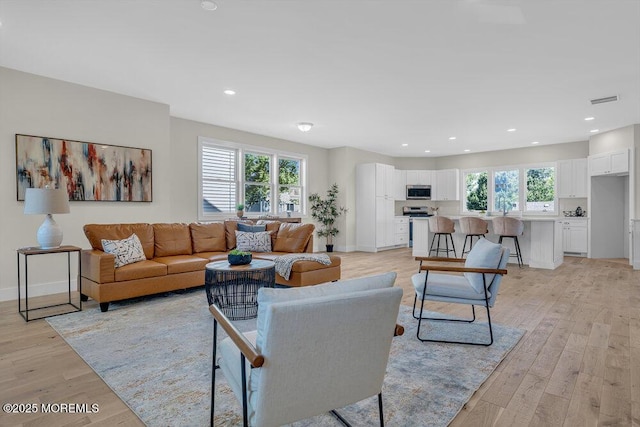45 Shore Acres Ave, North Middletown, NJ 07748 - living area with light wood-style flooring and recessed lighting