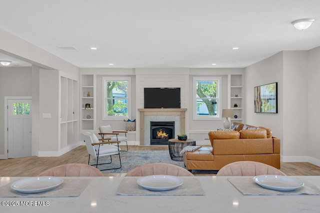 45 Shore Acres Ave, North Middletown, NJ 07748 - living room with built in features, light wood-type flooring, healthy amount of natural light, and recessed lighting
