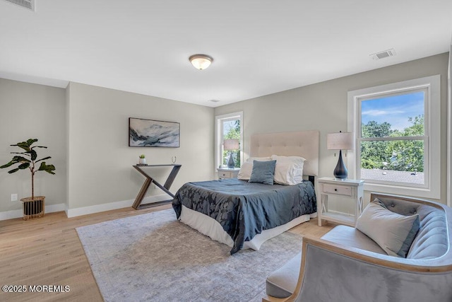 45 Shore Acres Ave, North Middletown, NJ 07748 - bedroom with light wood-style flooring and baseboards