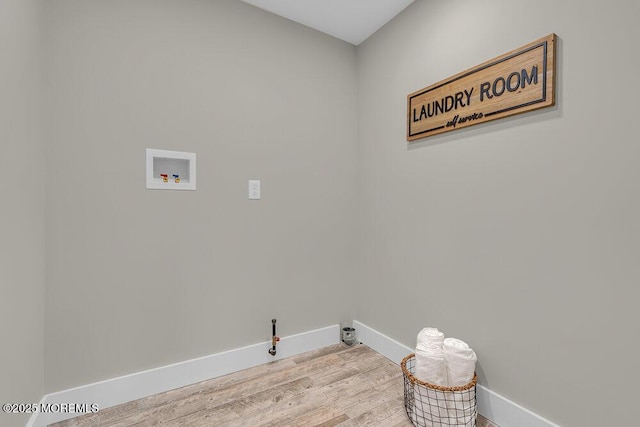 45 Shore Acres Ave, North Middletown, NJ 07748 - laundry room with washer hookup, gas dryer hookup, and light wood-type flooring