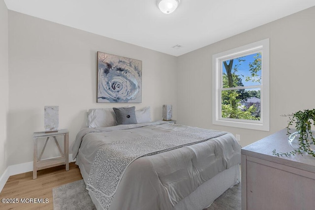 45 Shore Acres Ave, North Middletown, NJ 07748 - bedroom featuring light wood-style flooring and baseboards