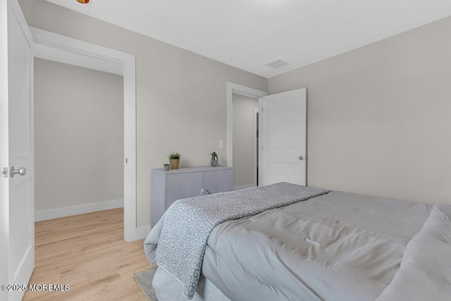 45 Shore Acres Ave, North Middletown, NJ 07748 - bedroom with light wood-style floors and baseboards