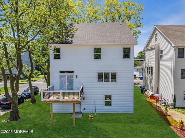 45 Shore Acres Ave, North Middletown, NJ 07748 - back of property with a yard and a deck
