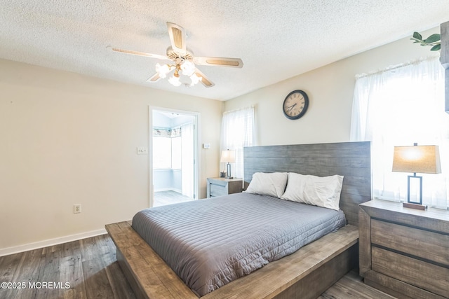 887 Beach Haven W Blvd, Manahawkin, NJ 08050 - bedroom featuring a textured ceiling, wood finished floors, and ceiling fan