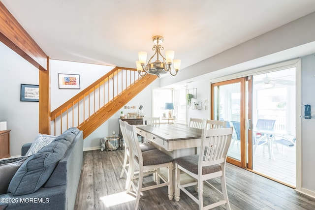 887 Beach Haven W Blvd, Manahawkin, NJ 08050 - dining room featuring stairs, a chandelier, and wood finished floors