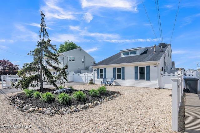 887 Beach Haven W Blvd, Manahawkin, NJ 08050 - back of house with a gate, a fenced backyard, a patio area, and roof with shingles