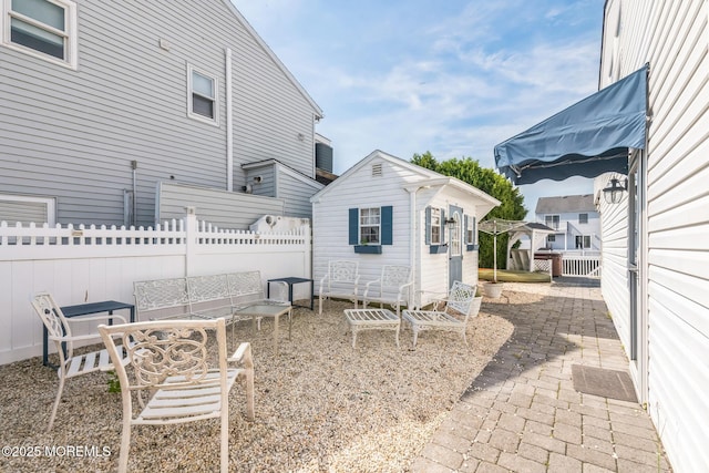 887 Beach Haven W Blvd, Manahawkin, NJ 08050 - back of house with an outdoor structure and a patio