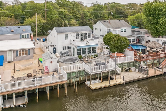 887 Beach Haven W Blvd, Manahawkin, NJ 08050 - rear view of property featuring a deck with water view and stairway