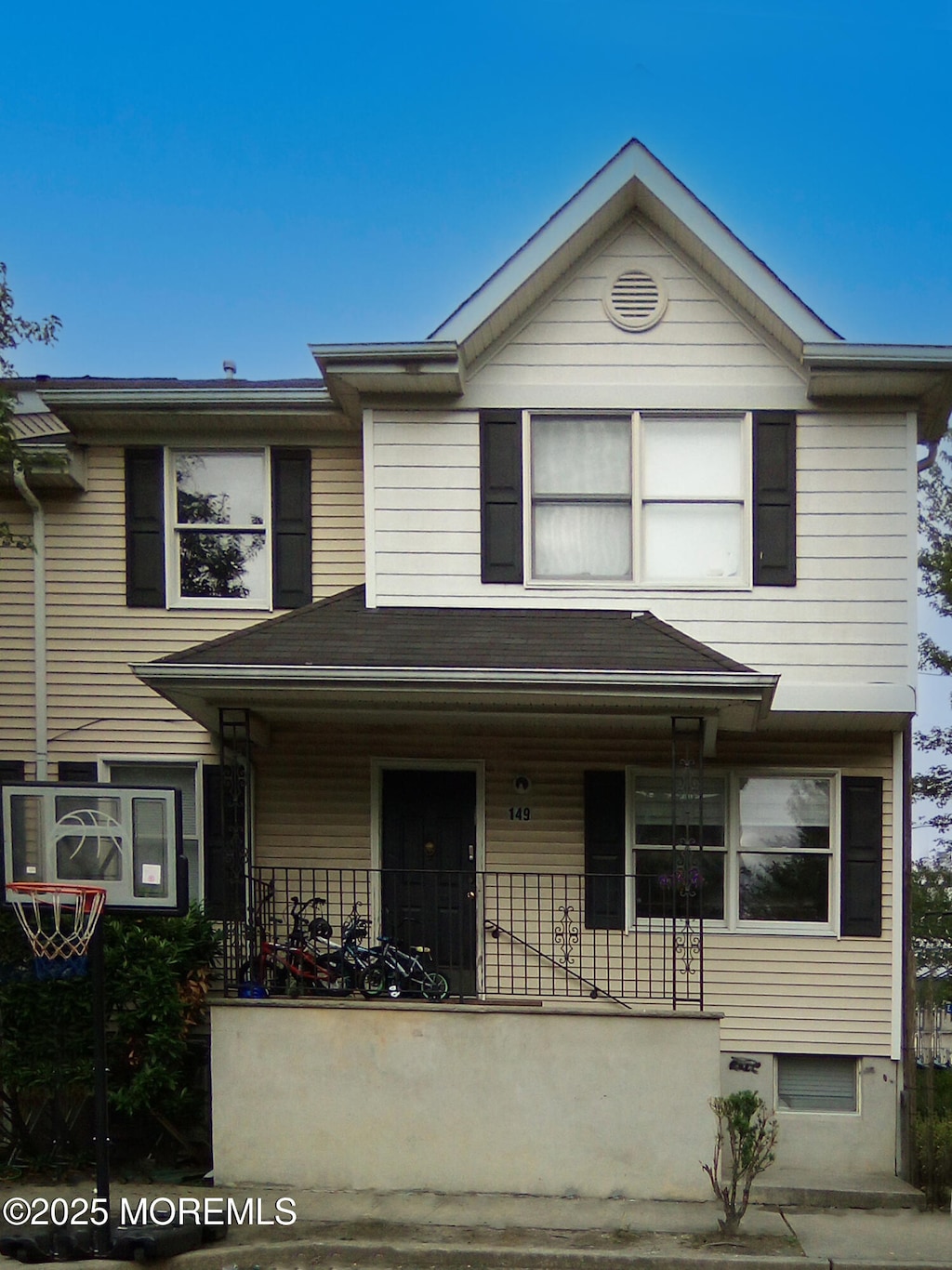 149 E 4th St, Lakewood, NJ 08701 - view of front of property with a porch