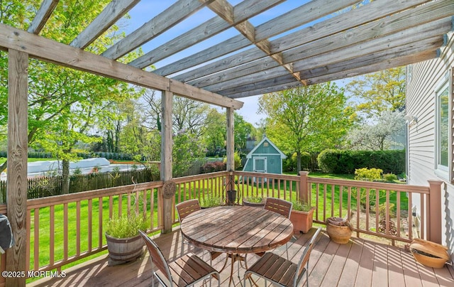 408 Brookdale Ave, Long Branch, NJ 07740 - wooden deck with a storage shed, a fenced backyard, and view of wooded area