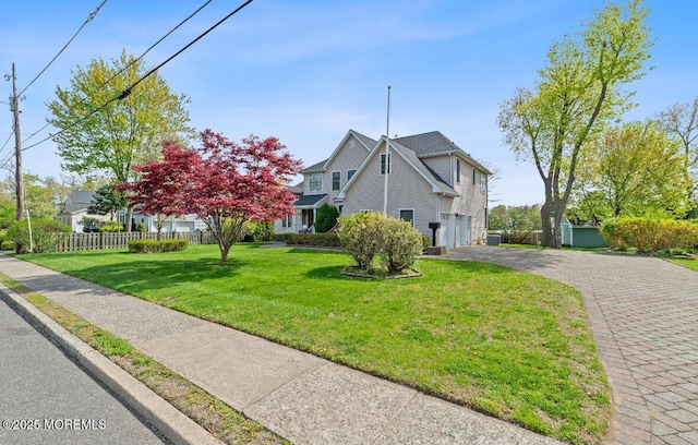 408 Brookdale Ave, Long Branch, NJ 07740 - traditional-style house with decorative driveway and a garage
