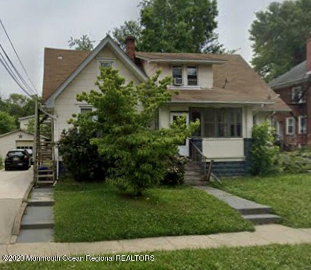 206 Evergreen Ave, Oaklyn, NJ 08107 - bungalow-style house featuring an outdoor structure, concrete driveway, a front lawn, and a chimney
