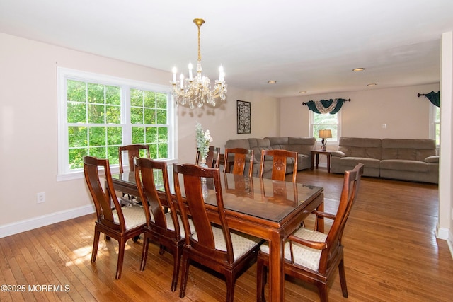 67 School Rd E, Marlboro, NJ 07746 - dining area featuring a chandelier and light wood finished floors