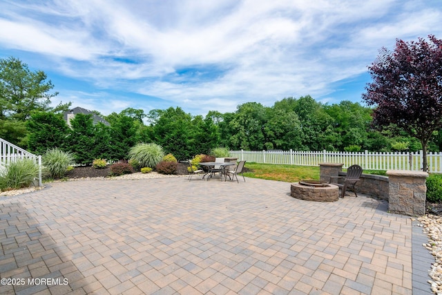 67 School Rd E, Marlboro, NJ 07746 - view of patio with a fire pit and outdoor dining area
