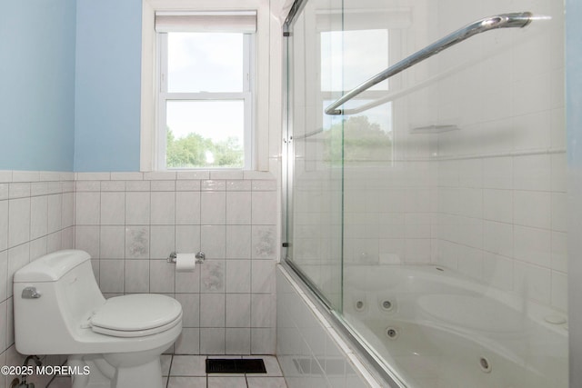 67 School Rd E, Marlboro, NJ 07746 - bathroom featuring a combined bath / shower with jetted tub, tile walls, and tile patterned floors