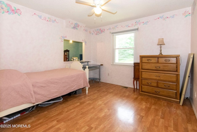 67 School Rd E, Marlboro, NJ 07746 - bedroom with light wood-style floors and a ceiling fan