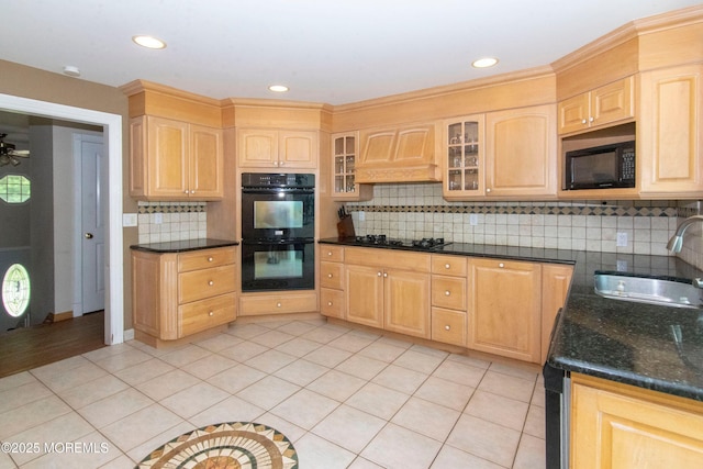 67 School Rd E, Marlboro, NJ 07746 - kitchen with black appliances, custom exhaust hood, light brown cabinetry, decorative backsplash, and recessed lighting
