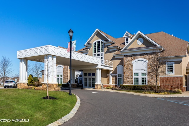 5 Gainsborough Ln, Manchester, NJ 08759 - view of property featuring asphalt driveway and a carport