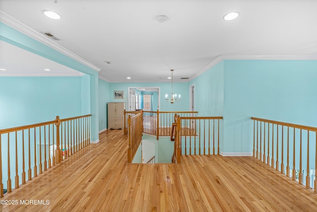 3 Knightsbridge Pl, Jackson, NJ 08527 - hall featuring an upstairs landing, wood finished floors, a chandelier, ornamental molding, and recessed lighting