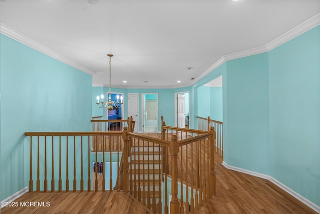 3 Knightsbridge Pl, Jackson, NJ 08527 - hall featuring an upstairs landing, wood finished floors, a chandelier, ornamental molding, and recessed lighting