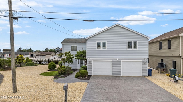 28 S Dayton Dr, Little Egg Harbor, NJ 08087 - view of front of house with decorative driveway and a garage