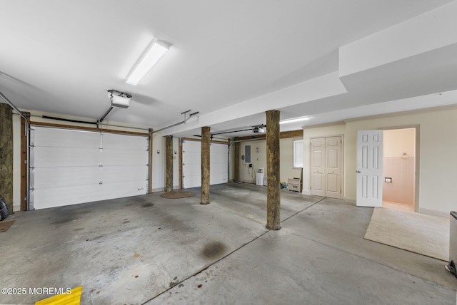 28 S Dayton Dr, Little Egg Harbor, NJ 08087 - garage with a garage door opener and electric panel