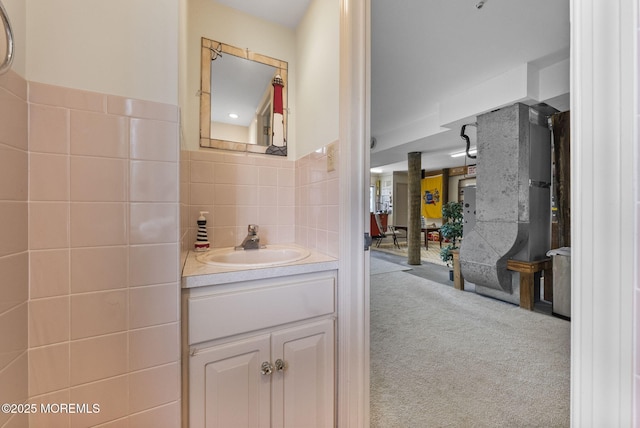 28 S Dayton Dr, Little Egg Harbor, NJ 08087 - bathroom with tile walls, vanity, and a wainscoted wall