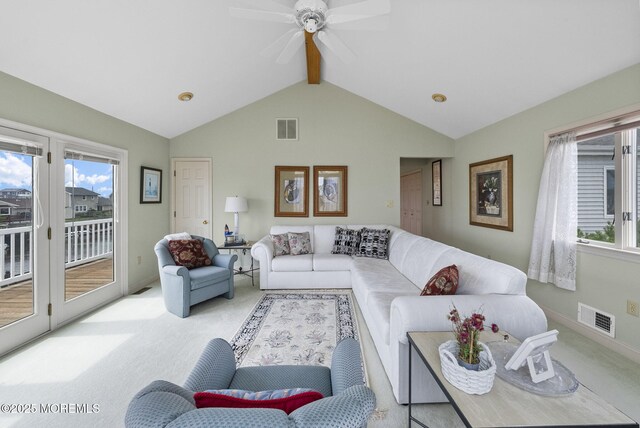 28 S Dayton Dr, Little Egg Harbor, NJ 08087 - living room featuring light colored carpet, plenty of natural light, and a ceiling fan