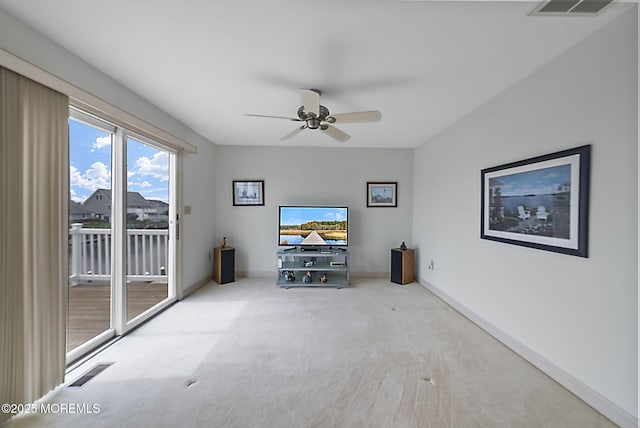 28 S Dayton Dr, Little Egg Harbor, NJ 08087 - unfurnished living room featuring carpet and a ceiling fan