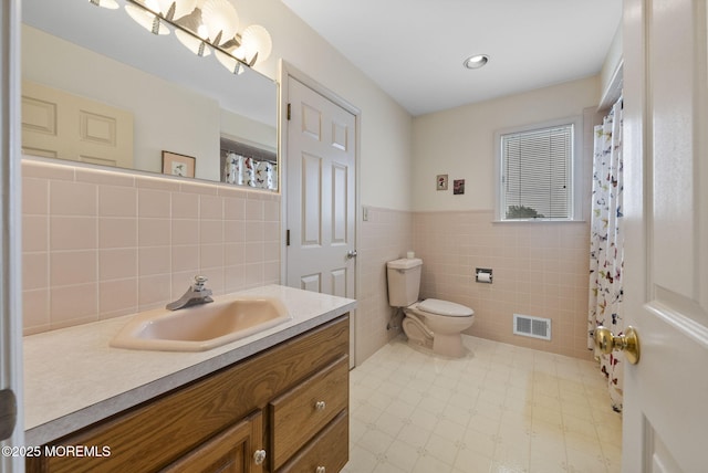 28 S Dayton Dr, Little Egg Harbor, NJ 08087 - full bath featuring tile walls, vanity, a wainscoted wall, and a shower with curtain