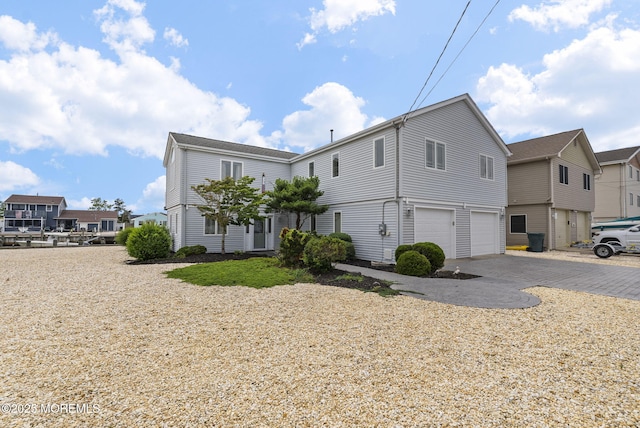 28 S Dayton Dr, Little Egg Harbor, NJ 08087 - view of side of home featuring driveway and a garage