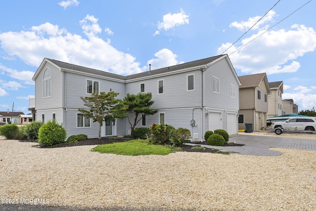 28 S Dayton Dr, Little Egg Harbor, NJ 08087 - view of side of property with driveway and an attached garage