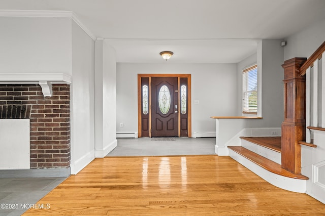 334 Norgrove Pl, Elberon, NJ 07740 - foyer entrance featuring a baseboard radiator, stairway, and wood finished floors