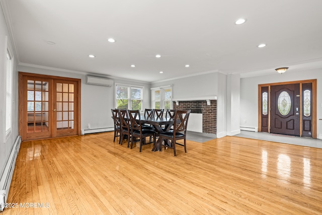 334 Norgrove Pl, Elberon, NJ 07740 - dining room with an AC wall unit, baseboard heating, crown molding, light wood finished floors, and recessed lighting