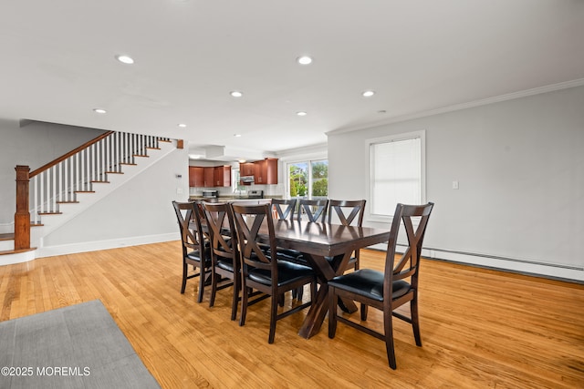 334 Norgrove Pl, Elberon, NJ 07740 - dining space featuring ornamental molding, light wood-style floors, stairway, and recessed lighting