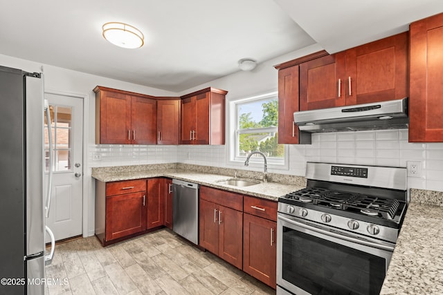 334 Norgrove Pl, Elberon, NJ 07740 - kitchen featuring stainless steel appliances, under cabinet range hood, tasteful backsplash, and light stone countertops