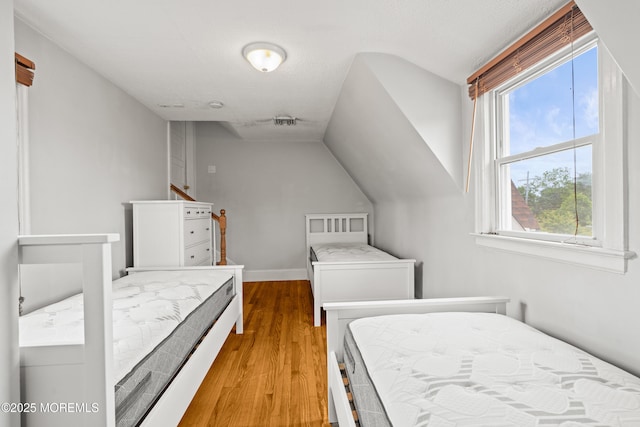 334 Norgrove Pl, Elberon, NJ 07740 - bedroom with multiple windows and wood finished floors