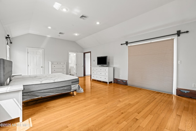 334 Norgrove Pl, Elberon, NJ 07740 - bedroom with vaulted ceiling, light wood-style flooring, a barn door, recessed lighting, and ensuite bath