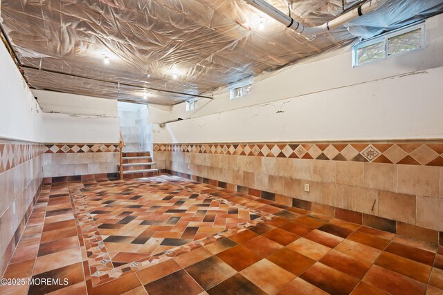 334 Norgrove Pl, Elberon, NJ 07740 - below grade area with a wainscoted wall and tile walls