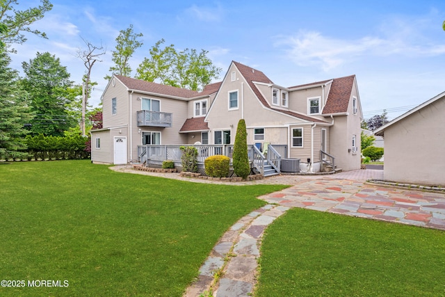 334 Norgrove Pl, Elberon, NJ 07740 - back of property with a balcony, a yard, and a patio
