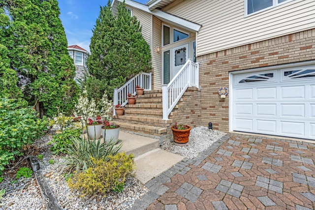 259 Cypress Dr, Bayville, NJ 08721 - view of exterior entry with brick siding and a garage