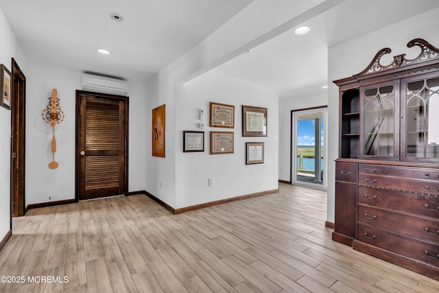 259 Cypress Dr, Bayville, NJ 08721 - entryway with a wall mounted air conditioner, light wood finished floors, and recessed lighting