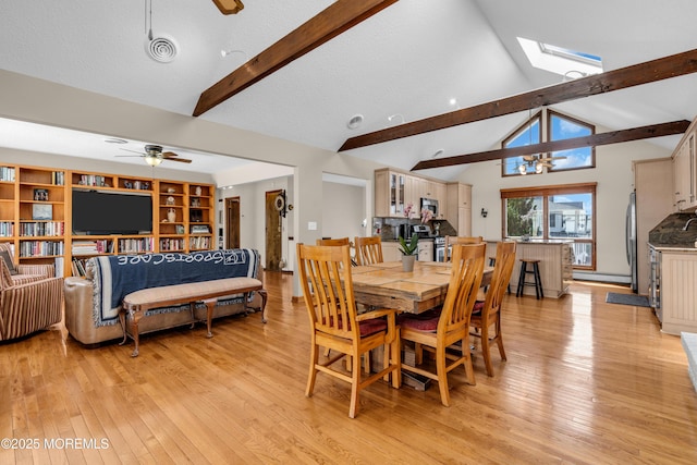 259 Cypress Dr, Bayville, NJ 08721 - dining space with a ceiling fan, light wood finished floors, and a skylight