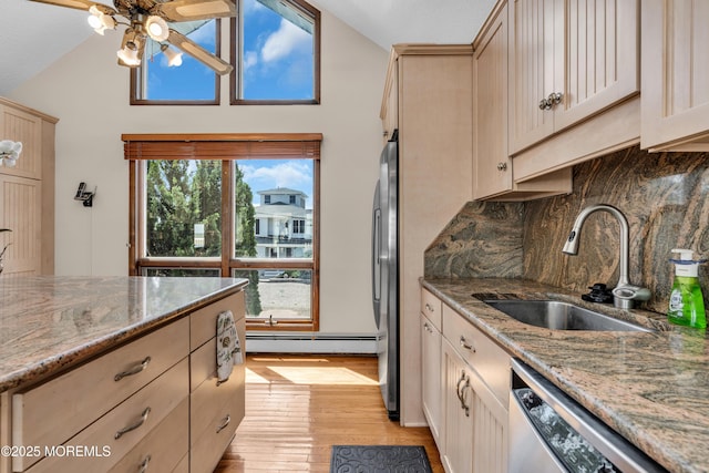259 Cypress Dr, Bayville, NJ 08721 - kitchen with a baseboard radiator, appliances with stainless steel finishes, tasteful backsplash, a ceiling fan, and light wood finished floors