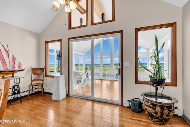 259 Cypress Dr, Bayville, NJ 08721 - entryway with baseboard heating, hardwood / wood-style floors, high vaulted ceiling, and a ceiling fan