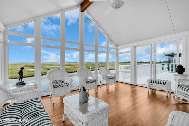 259 Cypress Dr, Bayville, NJ 08721 - sunroom featuring high vaulted ceiling, beam ceiling, wood finished floors, a wall of windows, and a water view